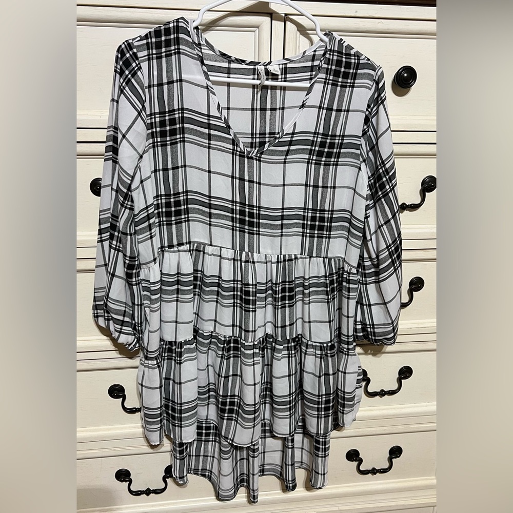 Black and white plaid shirt. Size small